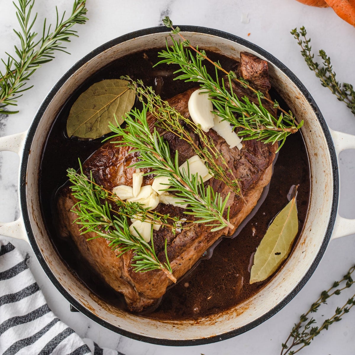 Tender Dutch-oven pot roast with carrots and red wine