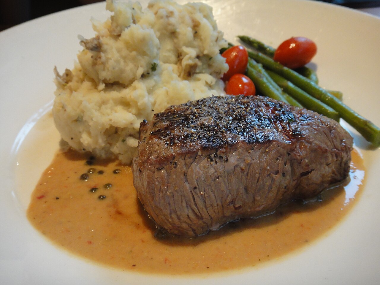 Top sirloin steak with peppercorn sauce